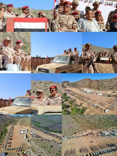 اخبار اليمن الان عسكري يرفع اعلام اليمن صورة اخبار اليمن الان الحدث اليوم عاجل